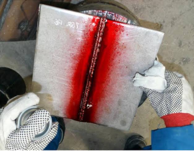 Dye Penetrant Testing Lahore by CEAF TECH inspecting welds and metal components for surface cracks and defects.