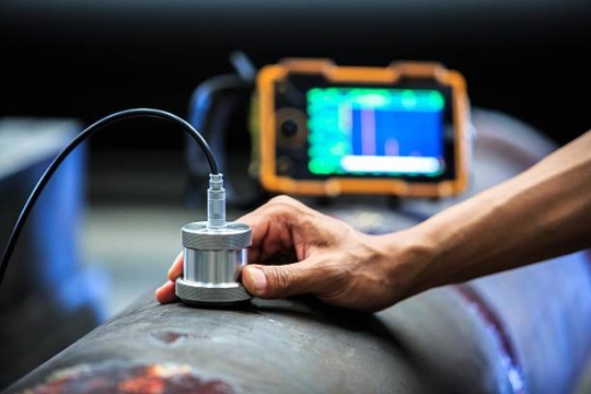 NDT Services Lahore by CEAF TECH performing non-destructive testing on industrial equipment and welded components.